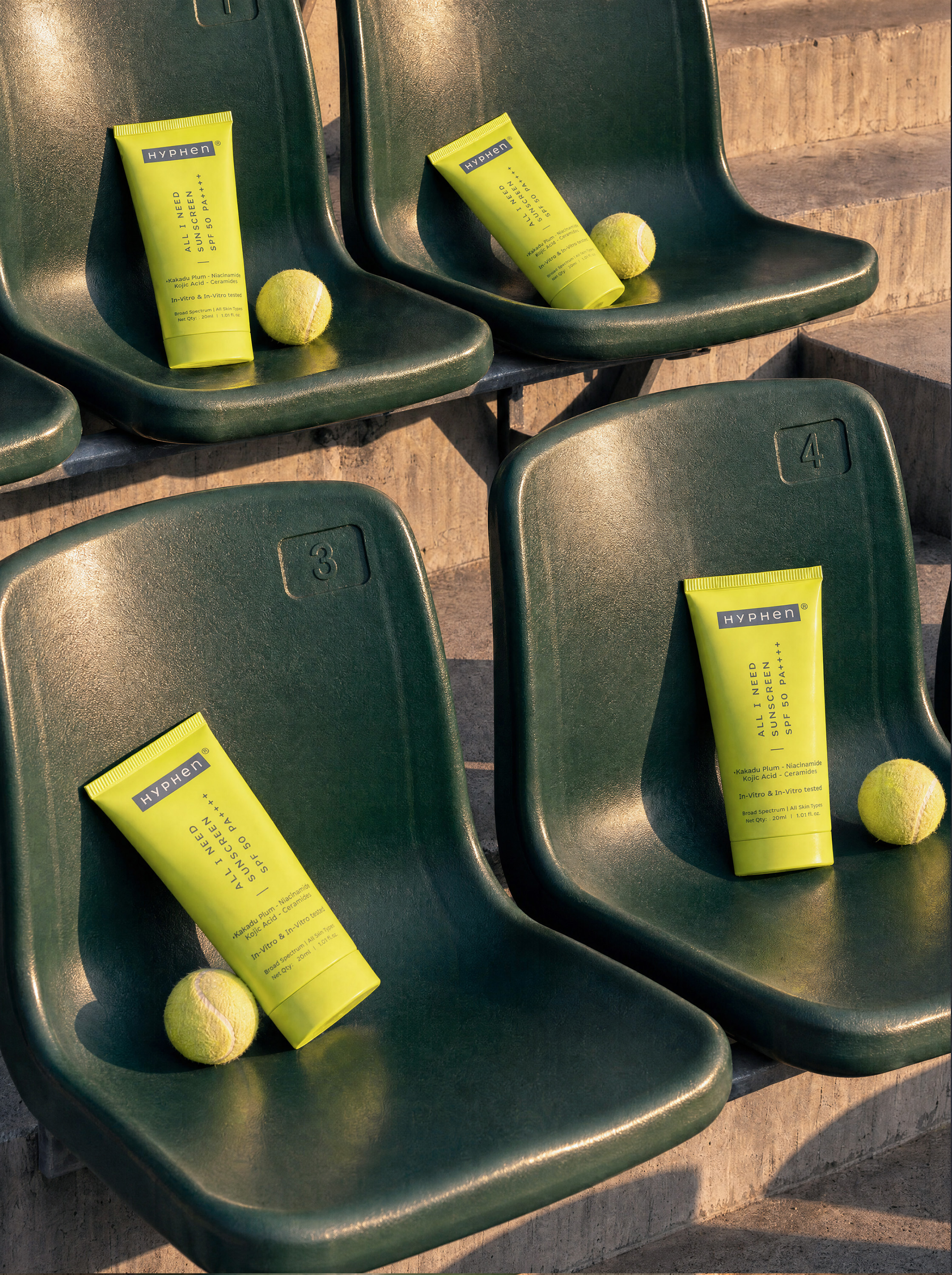 HYPHeN tubes arranged across stadium seats with tennis balls